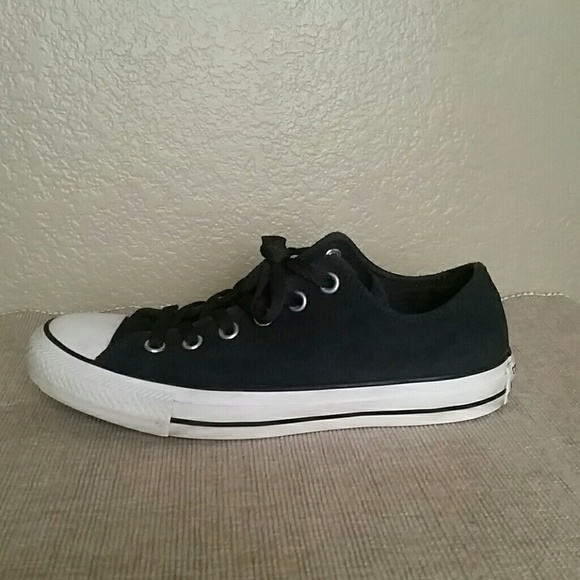 navy blue leather chuck taylors